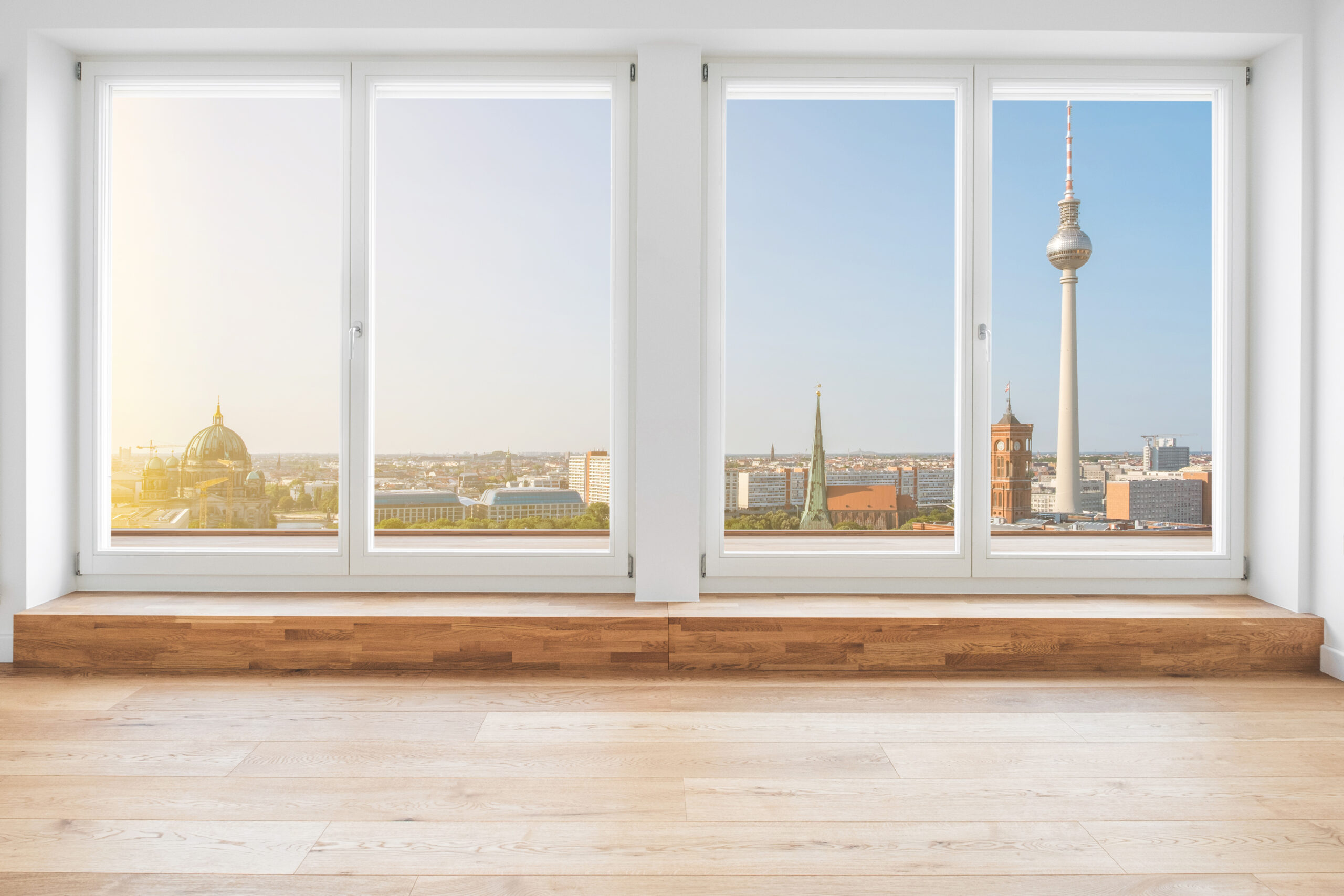 Berlin skyline through terrace windows – modern penthouse apartment room